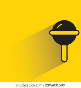 candy stick icon with shadow on yellow background
