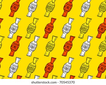 Candy. Yellow seamless background.