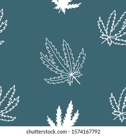 Cannabis leaves seamless pattern on blue background.