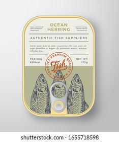 Canned Ocean Fish Abstract Vector Aluminium Container Packaging Design or Label. Modern Typography Banner, Hand Drawn Herring Silhouette with Lettering Logo. Color Paper Background Layout. Isolated.