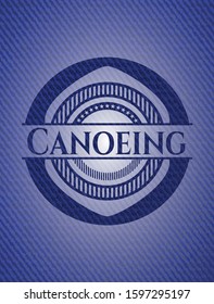 Canoeing badge with denim texture. Vector Illustration. Detailed.
