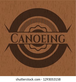 Canoeing wood icon or emblem