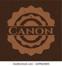 Canon badge with wood background