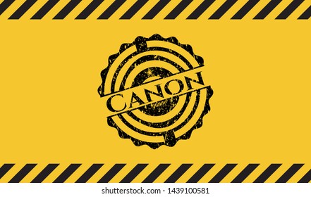 Canon black grunge emblem inside yellow warning sign. Vector Illustration. Detailed.