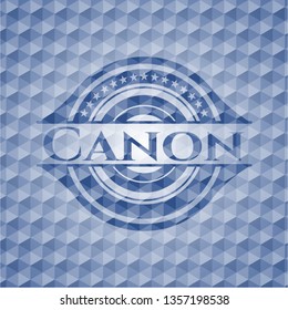 Canon blue emblem with geometric pattern.