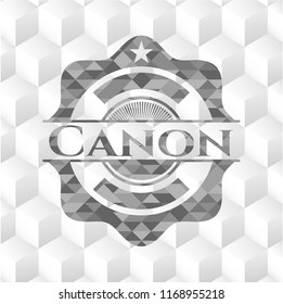 Canon grey badge with geometric cube white background