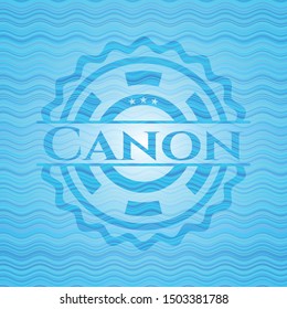 Canon light blue water emblem. Vector Illustration. Detailed.