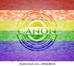 Canon on mosaic background with the colors of the LGBT flag. 