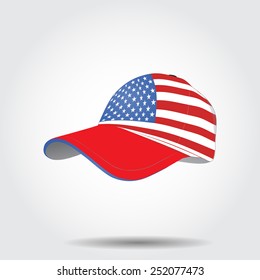 Cap with a flag of America, a shadow on gray background