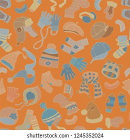 Cap, gloves, scarf, socks. Winter accessories, seamless pattern. Hand drawn vector illustration.
