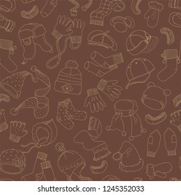 Cap, gloves, scarf, socks. Winter accessories, seamless pattern. Hand drawn vector illustration.
