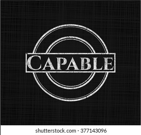 Capable chalk emblem written on a blackboard