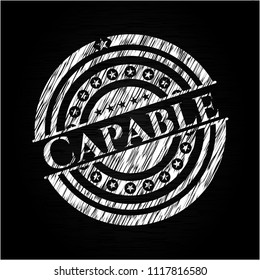 Capable chalkboard emblem written on a blackboard