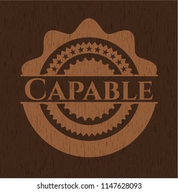 Capable wooden emblem