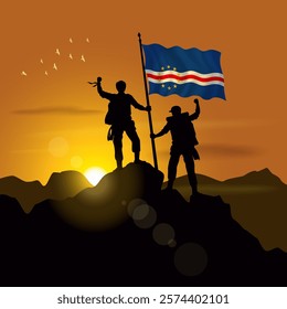 Cape Verde flag, silhouette of two climbers holding flags at sunset