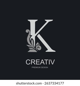 Capital Letter K with floral decorative element. Elegant monogram in silver on dark background. Perfect for logo, branding, boutique label, premium product design. Vector illustration.