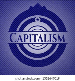 Capitalism badge with denim background