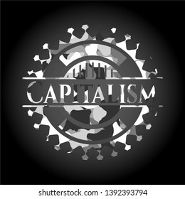 Capitalism on grey camo texture