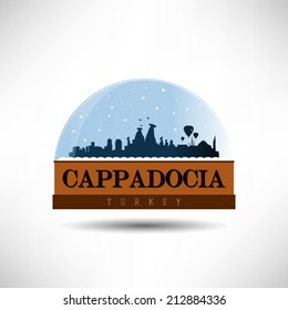 Cappadocia, Turkey city skyline silhouette in snow globe. Vector design.