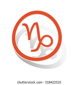 Capricorn sign sticker, orange circle with image inside, on white background