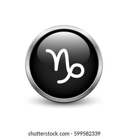 Capricorn zodiac symbol, black button with metal frame and shadow