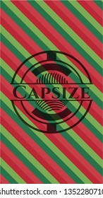 Capsize christmas emblem.