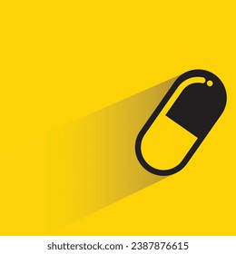 capsule with shadow on yellow background