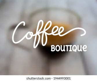 Überschrift: Kaffeeboutique. Zeichnen einer Kaffeetasse mit Herz und Kaffeebohnen. Für Werbung, Poster, Poster, Postkarte. Vektorgrafik. unscharfer Hintergrund.