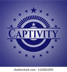 Captivity badge with denim background