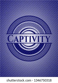 Captivity badge with denim background