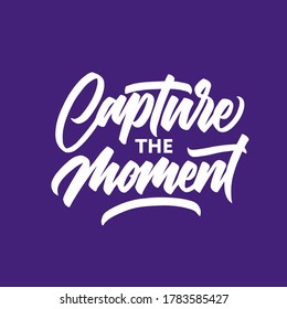 Capture the moment hand lettering brus calligraphy on purple background. hand made type.lettering design.