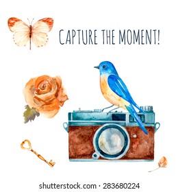 Capture the moment! Vintage watercolor camera with bird, flower, key and butterfly. Hand drawn vector illustration.