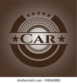 Car badge with wooden background