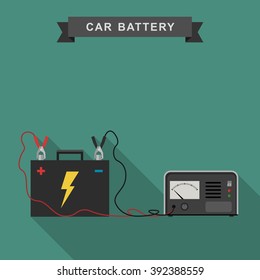 Car battery with connected cable for recharging.