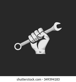 Car or bike workshop logo template (concept). Spanner in the hand. Vector illustration.