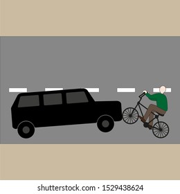 Car collides with a cyclist on the road