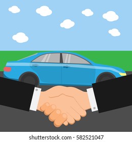 Car dealer and client shaking hands