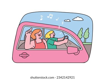 car driving holiday trip. Two friends are on a road trip, singing happily.