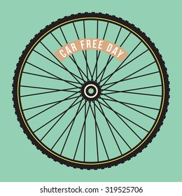 Car free day tag on bicycle wheel