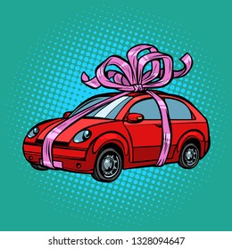 car gift, transport tied with festive ribbons. Pop art retro vector illustration drawing kitsch vintage