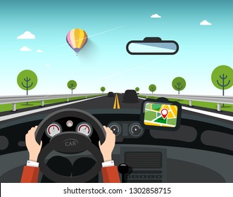 Car with GPS Navigation on Road. Hands on Steering Wheel with Sunny Day and Rural Landscape Behind the Window