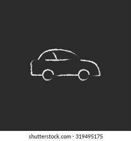 Car hand drawn in chalk on a blackboard vector white icon isolated on a black background.