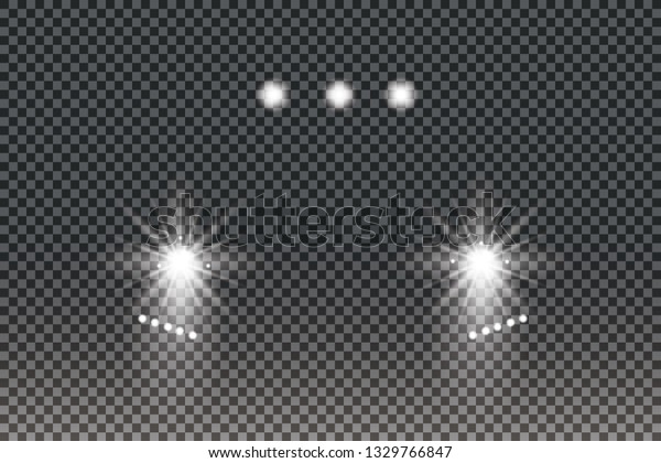 Car head lights shining from darkness
background.Vector silhouette of car with headlights on black
background. Easy light flash .Vector illustration.
