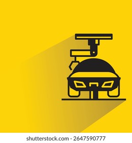car manufacturing icon with shadow on yellow background