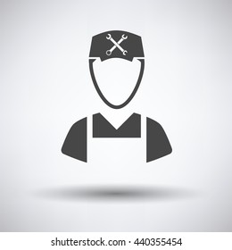 Car mechanic icon on gray background, round shadow. Vector illustration.