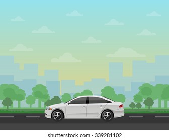 Car On The Road With Forest And Cityscape Background