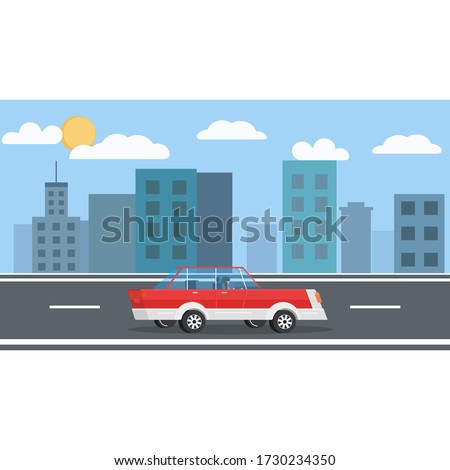The car rides through the middle of the city. Blue city and sunny day with clouds.