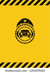 car seen from front icon black grunge emblem with yellow background. Vector Illustration. Detailed.