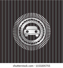 car seen from front icon inside silver badge or emblem