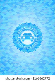 car seen from front icon inside sky blue emblem. Mosaic background